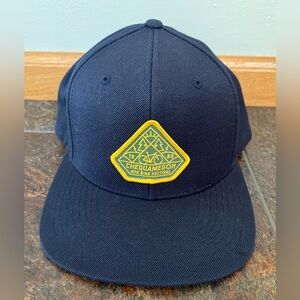 Chequamegon MTB bike festival blue flat brim hat.